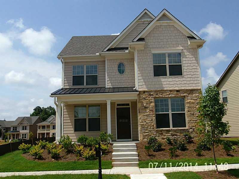 Exterior Front. Photo Example of a similar home. L