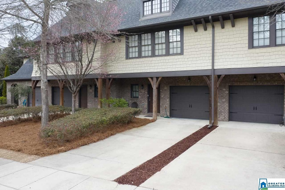 To desirable Inverness Cove townhome boasting main