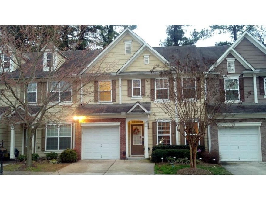 This lovely, well-maintained townhouse for sale in