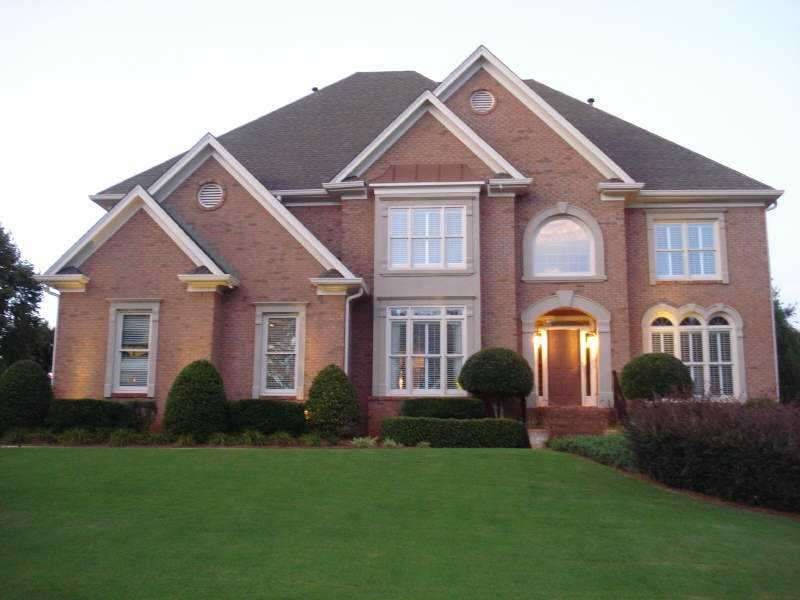 Exterior Front. IMMACULATE BRICK HOME