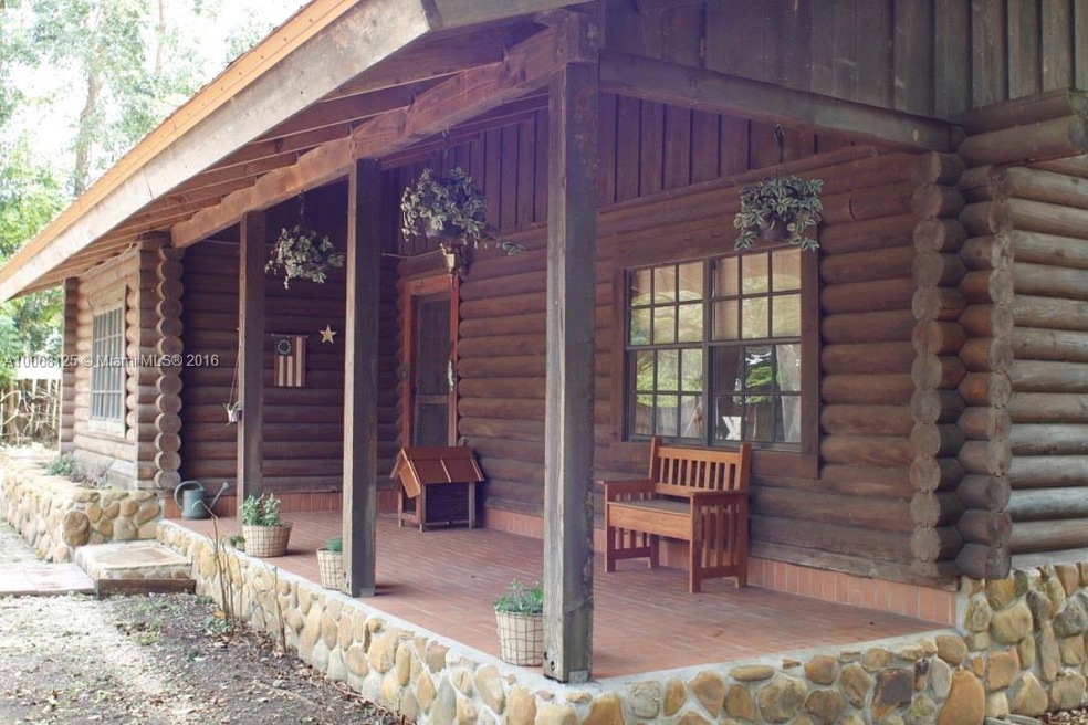 Front porch of log home