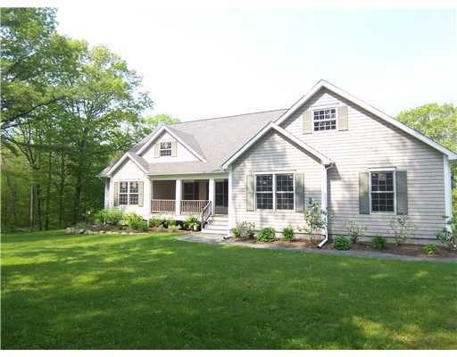 Exterior Front. Cobblestone and crushed stone walk