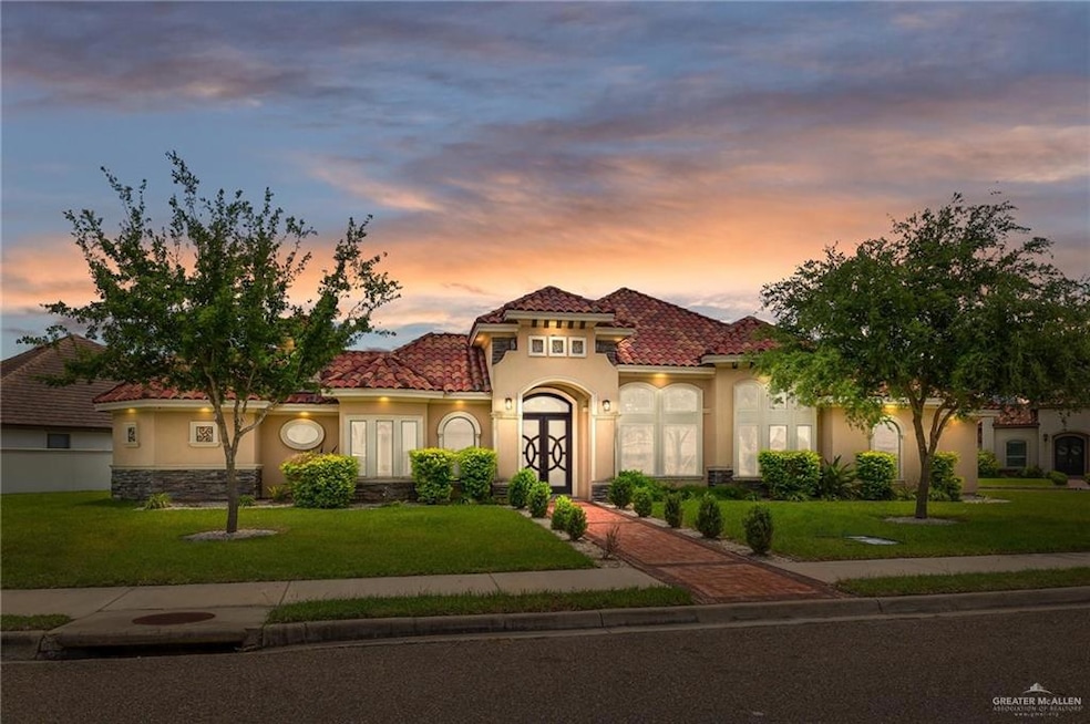 Mediterranean / spanish-style house with a yard