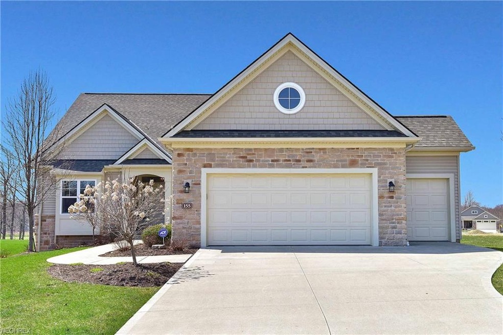 Front elevation with Stone & Vinyl, golf cart gara