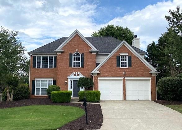 View of front of house featuring a front yard and 