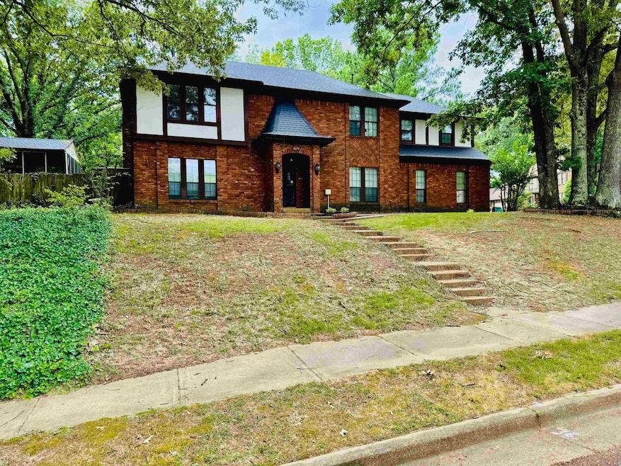 View of front of property with brick siding