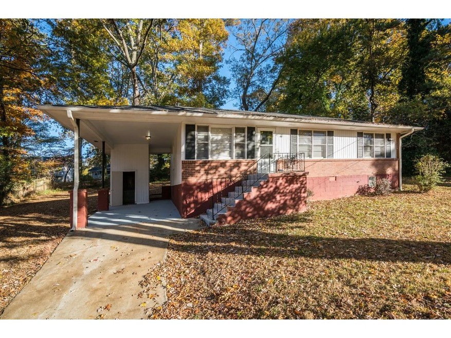 BRICK RANCH WITH THREE BEDROOMS