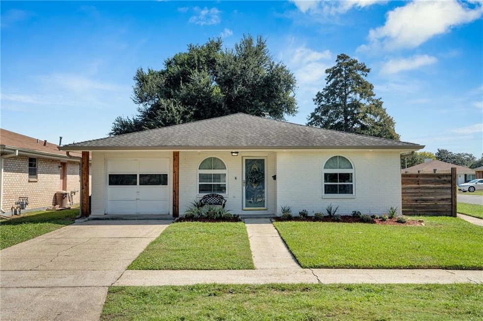 Coveted corner lot home in the heart of Metairie.