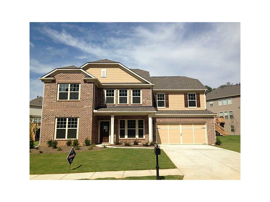 Exterior Front. Home is on .25 acre level lot. Car