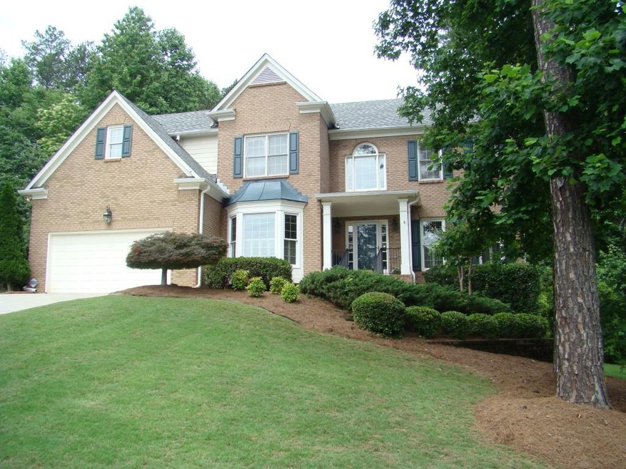 This lovely brick front & hardiplank siding home h
