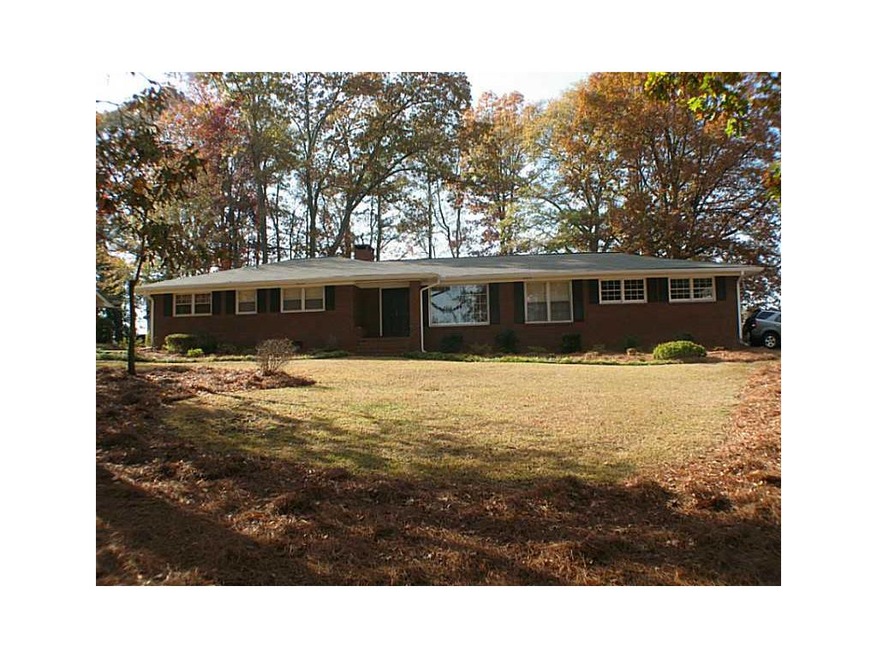 Exterior Front. Beautiful four sided brick ranch o