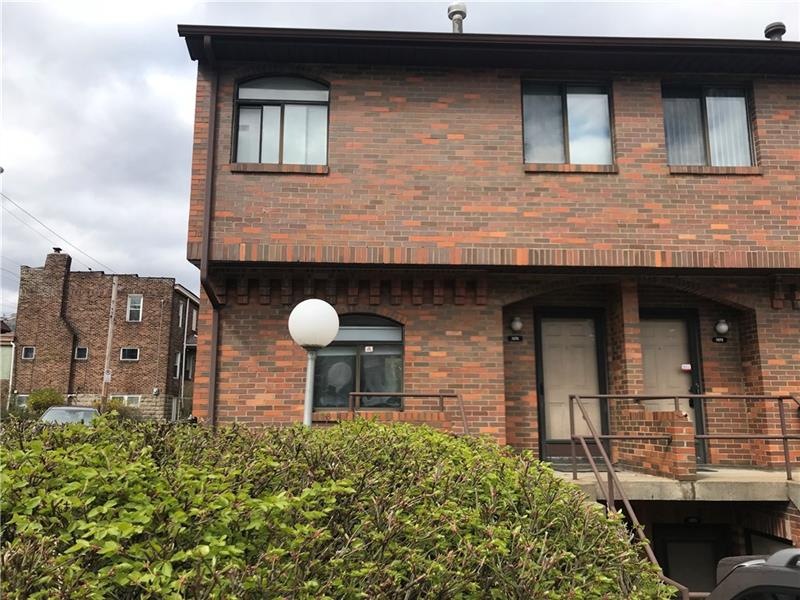 Fantastic opportunity! Two story brick end unit in