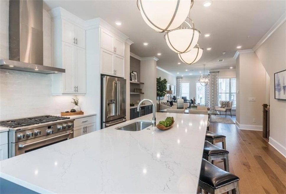 Bright kitchen open to dining area and family room