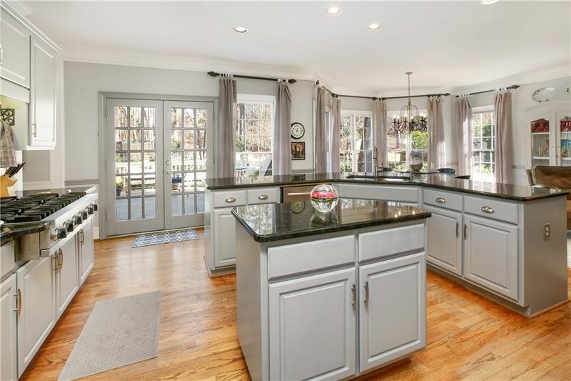 The inviting kitchen features a six burner Viking 