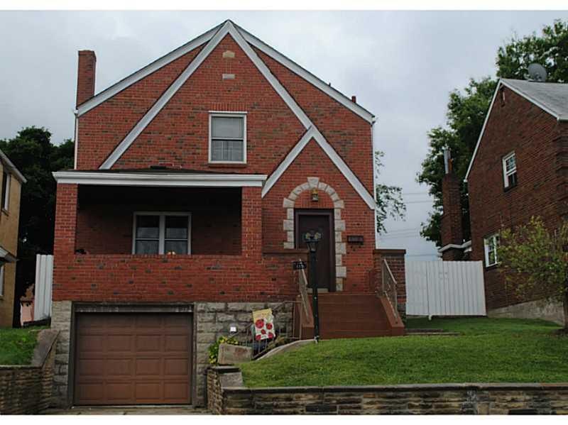 Exterior Front. Charming front porch creates a wel