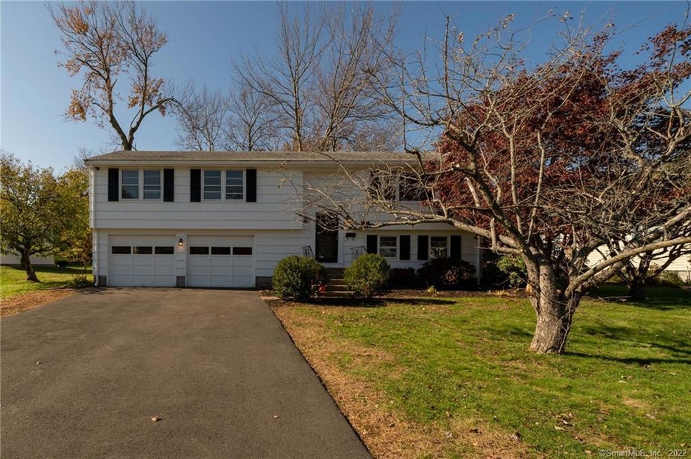 Oversized raised ranch situated in one of Wethersf
