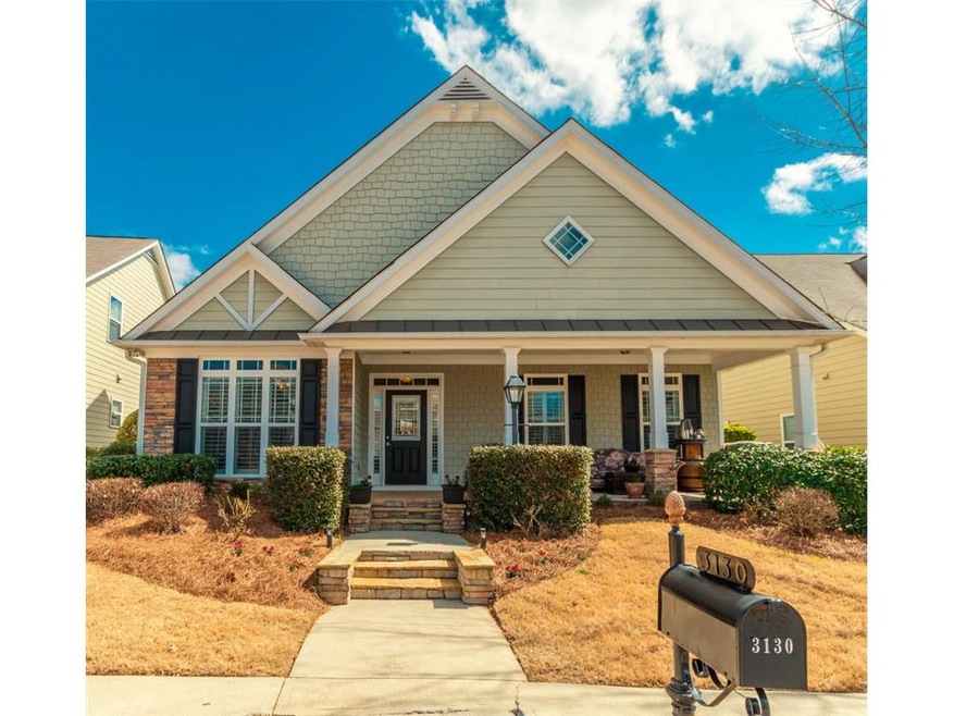 PRIVATE, EXTRA WIDE FRONT PORCH IN A CHARMING NEIG