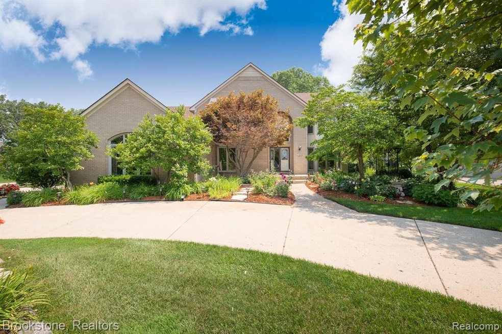 Stately front elevation with mature landscaping