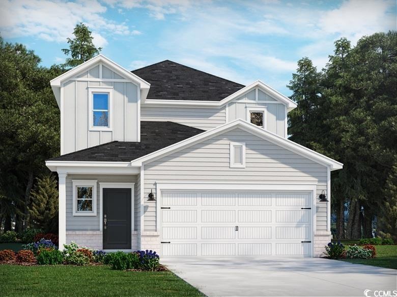 View of front facade with board and batten siding,