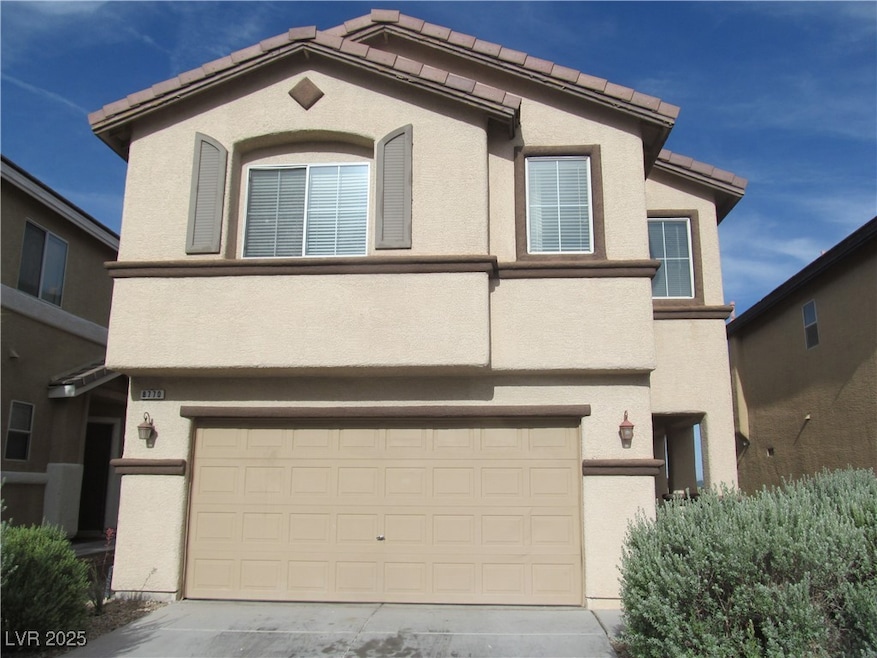 View of front of house featuring stucco siding, an