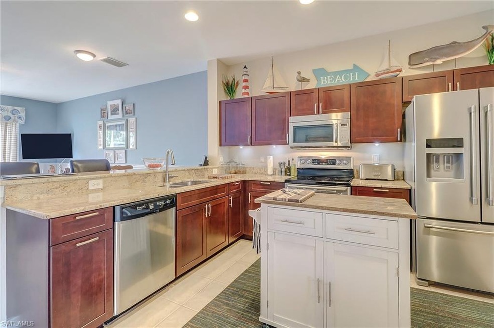 Upgraded kitchen with granite countertops, stainle