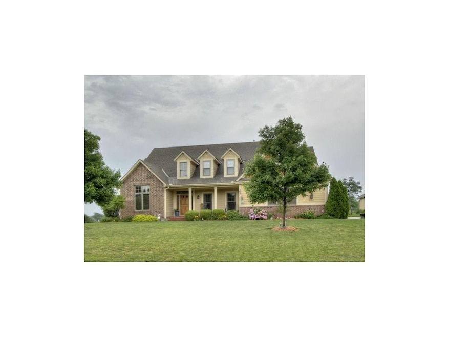 Cape Cod style with brick trim