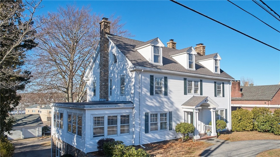 Front Exterior with driveway on left to garage and