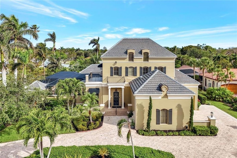French provincial home with a balcony