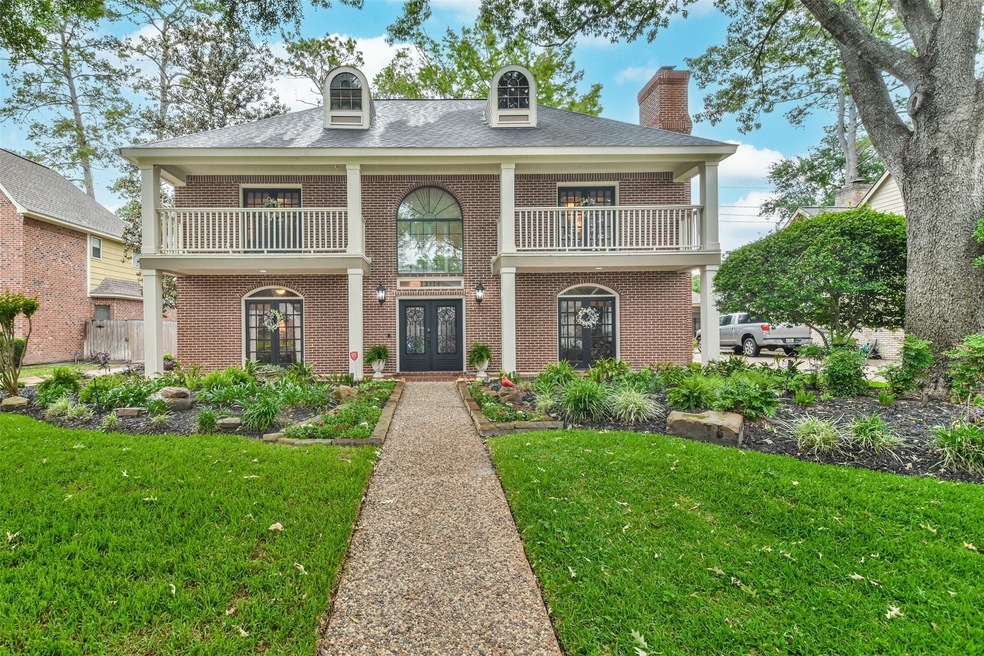 One of the most Iconic homes in Lakewood Glen! Absolutely stunning exterior and interior! So many updates! 2019 Windows, 2020 Custom Wrought iron doors. Lakewood Glen is a beautiful treelined community close to shopping and walking distance to several community favorite restaurants.