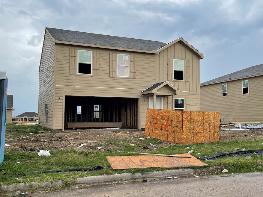 View of front of house featuring board and batten