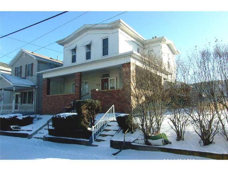 Exterior Front. Covered Front and Side Porch.   Si