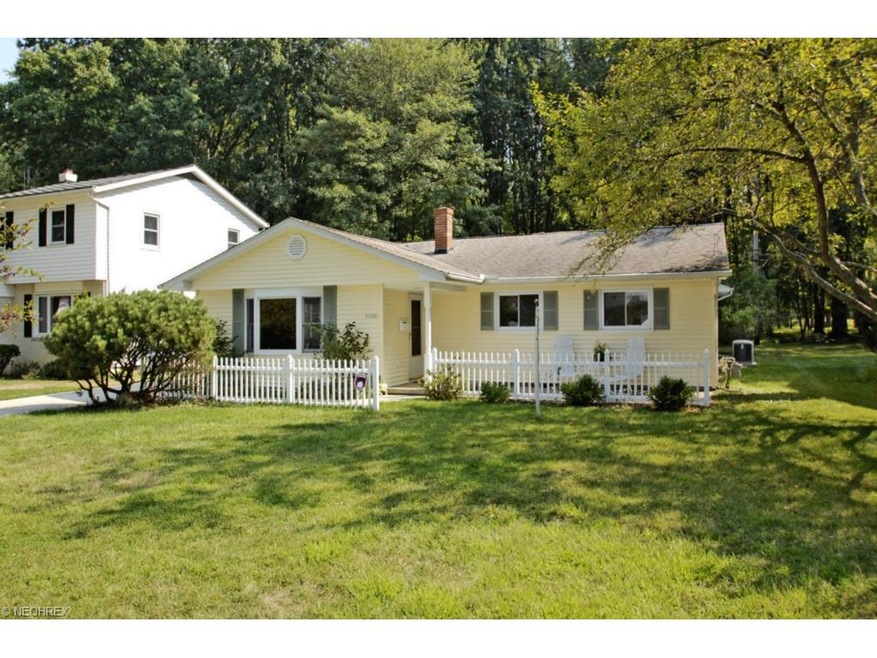 Cape Cod Style Ranch with Beautiful Stamped Patio in Picket Fenced Courtyard