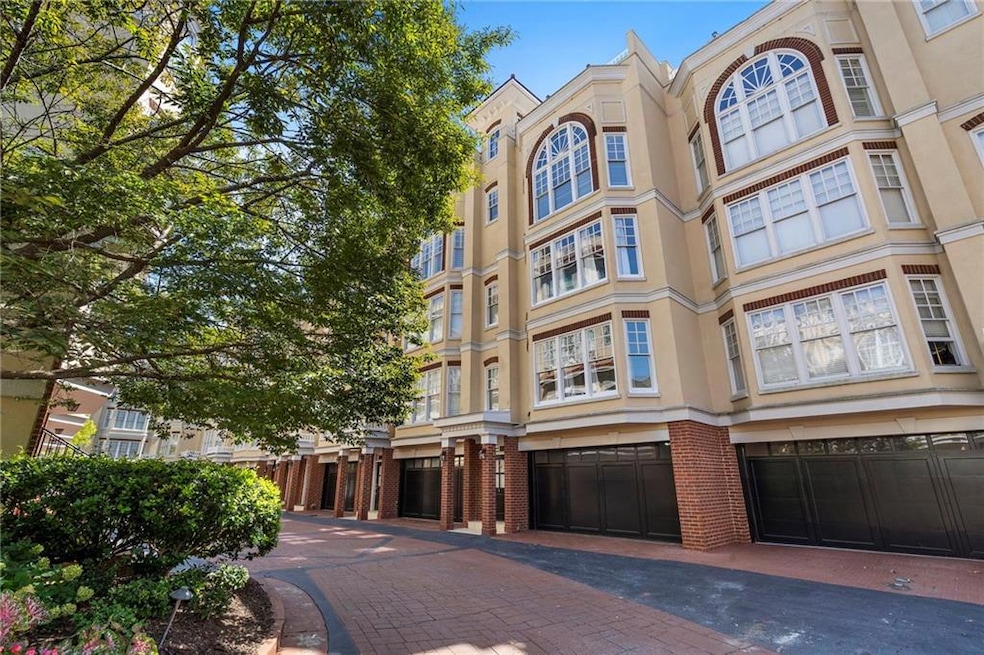 View of property featuring driveway
