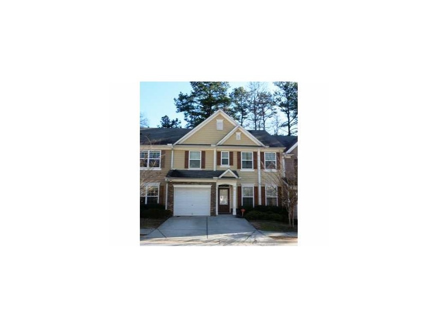 Exterior Front. Traditional townhome with 4 beds 2