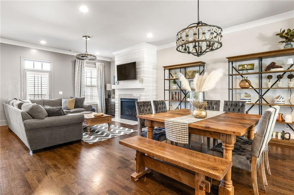 Dining area featuring dark hardwood / wood-style f