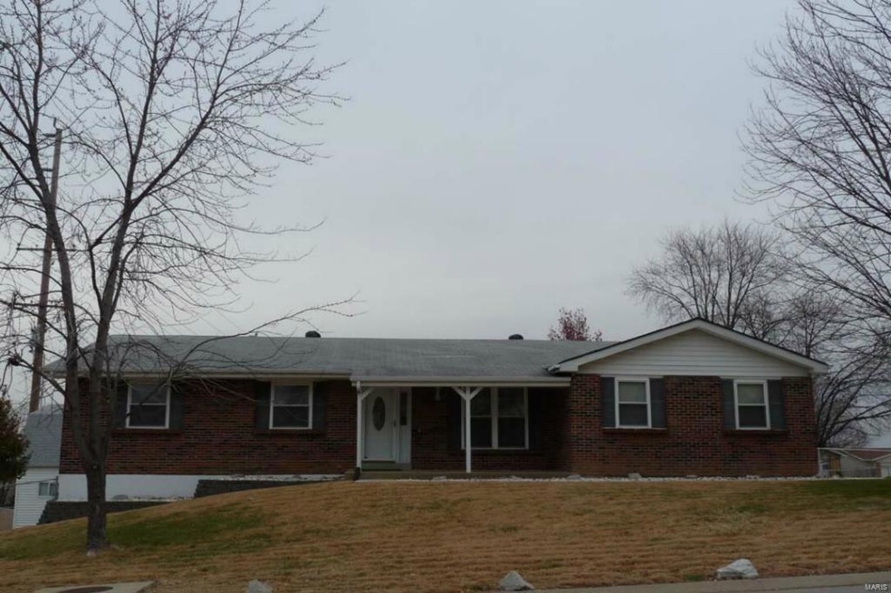 Low maintenance exterior with brick front, vinyl s