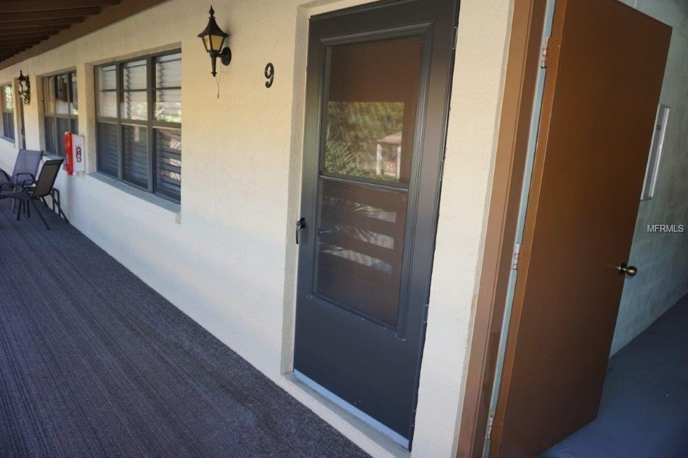 Entrance to condo with convenient laundry next doo