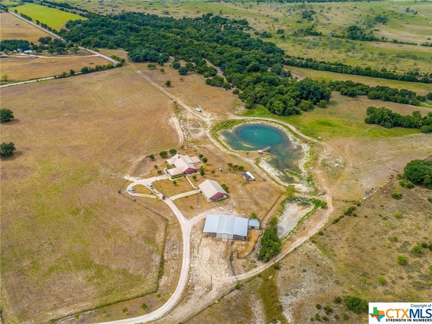 1003 CR 2207 62+ acres and 2 homes with large workshop, tank and Little Lucy Creek