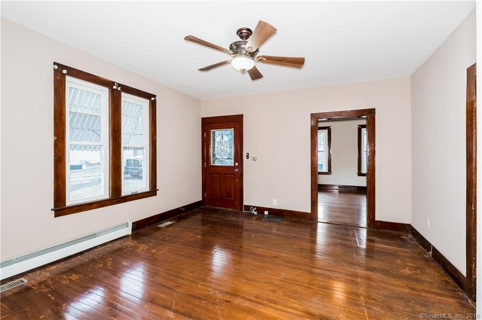 65 Maple St unit 1, Seymour, CT 06483 - photo 1