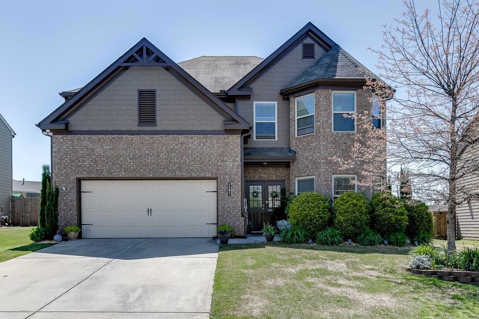 View of front of property featuring brick siding, 