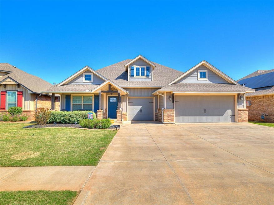 Craftsman-style house featuring roof with shingles