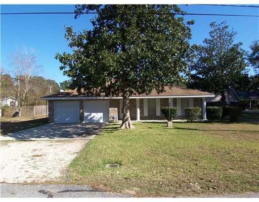 Photo. Front view of home. Second garage to right.