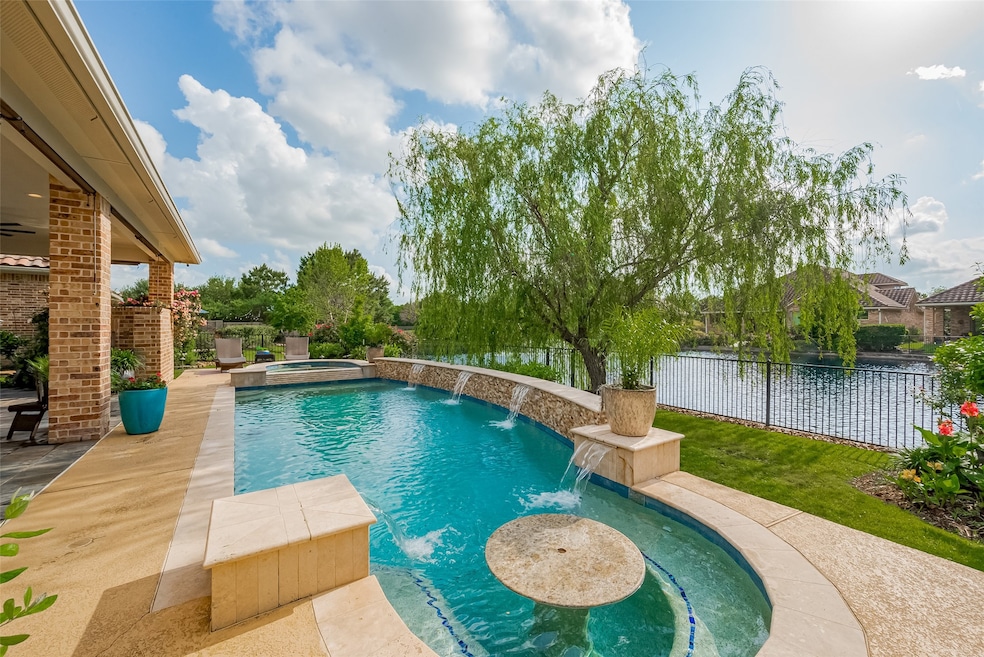 Heated pool spa, cool deck, water features.