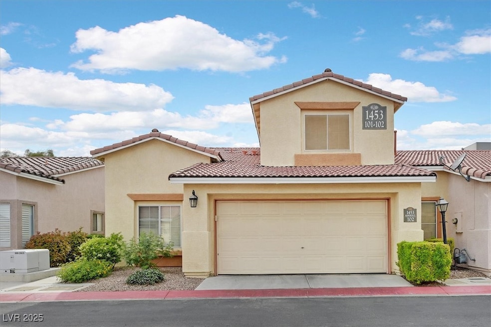 View of front of property featuring stucco siding,