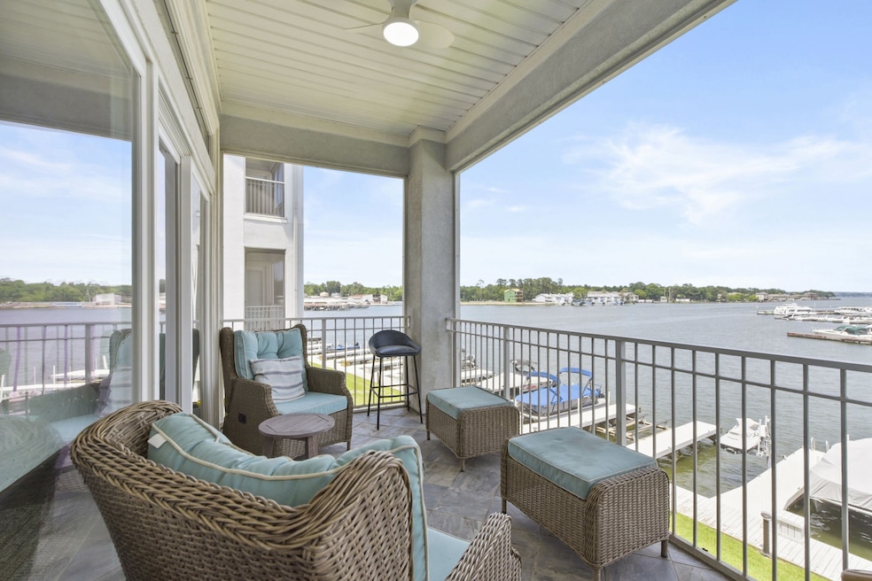 Spacious balcony with comfortable wicker seating,