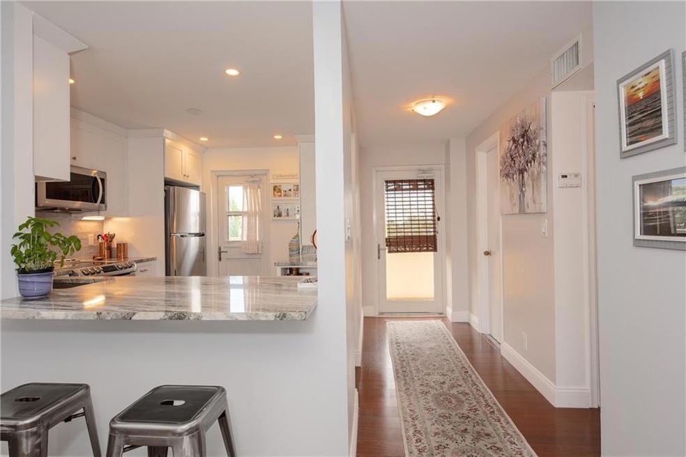 Upgraded kitchen and hurricane impact windows are