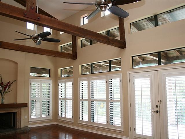 Lodge-style exposed trusses and high clerestory pa