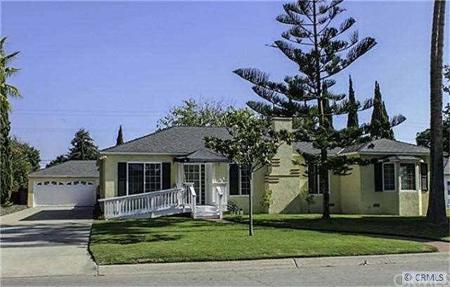 Front of home with wheelchair ramp.