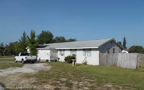 305 S Magnolia Ave, Lake Placid, FL 33852 - photo 1