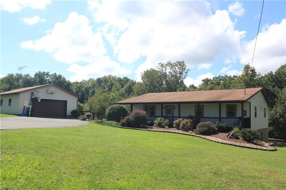 Lovely home on an acre! Oversized double garage.
